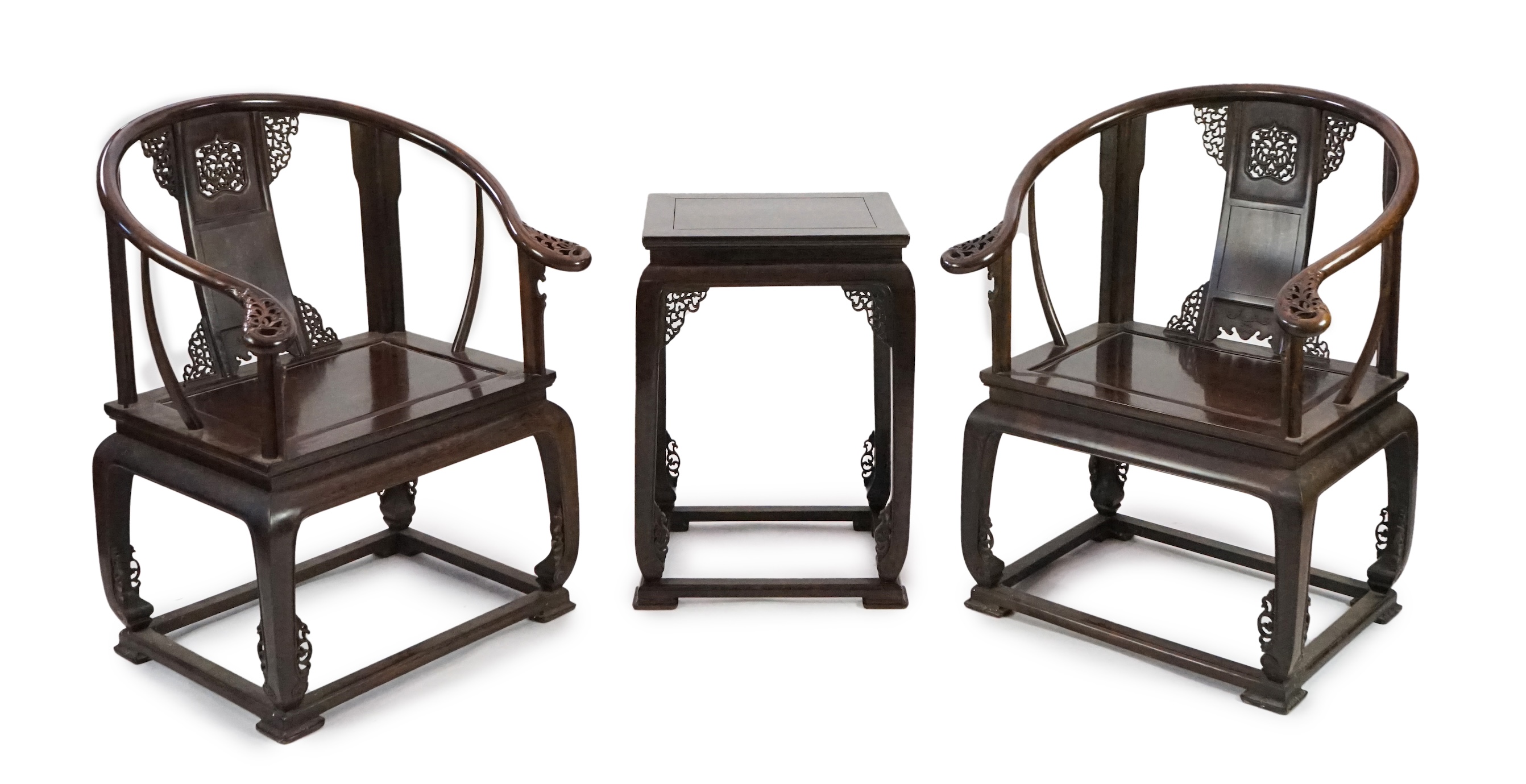 A pair of Chinese jichimu horseshoe shaped armchairs and a matching table, 19th/20th century